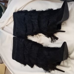 Knee high black fringe boots